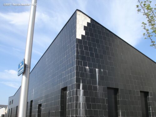Désordre bâtiment : Défauts de mise en oeuvre de carrelage en façade - Concours photo AQC 2007 - Patrick Beaunier