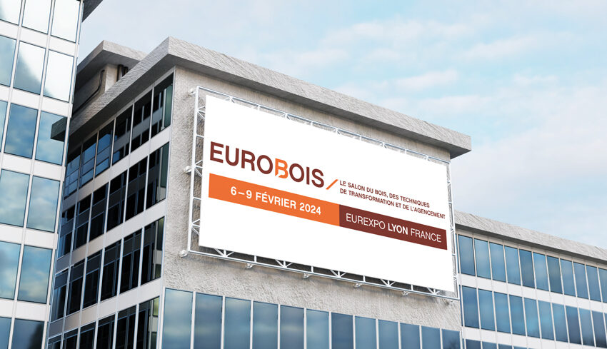 Logo d'Eurobois 2024, le salon du bois, des techniques de transformation et de l'agencement, sur un panneau publicitaire urbain