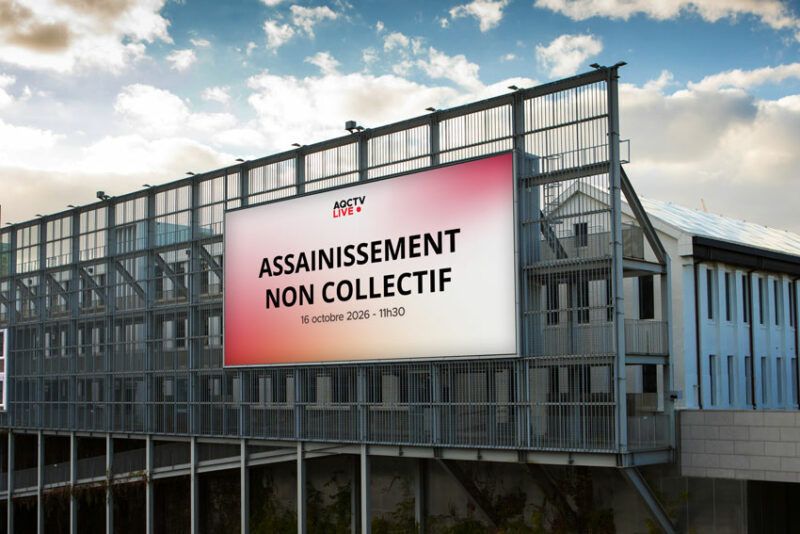 Logo de l'émission #AQCTVLIVE du16 octobre 2026, sur un panneau publicitaire urbain
